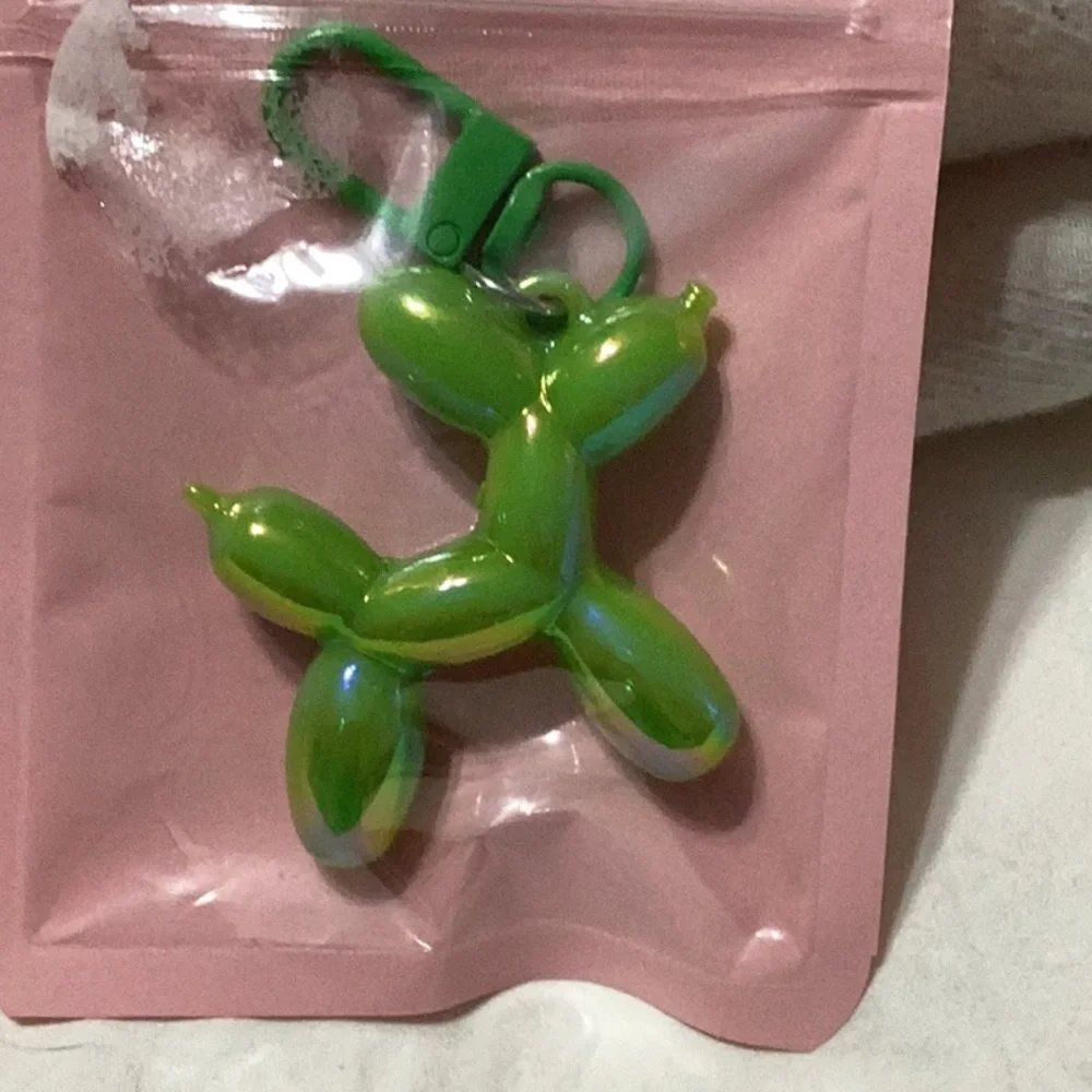 Balloon wiener dog key chain. Green iridescent. New in package